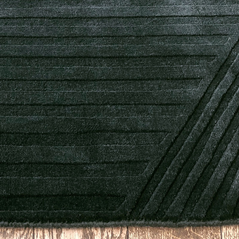 carved black rug